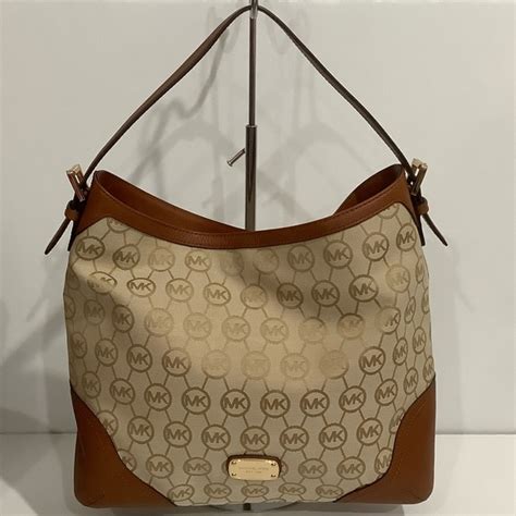 michael kors millbrook large shoulder bag|Michael Kors medium shoulder bag.